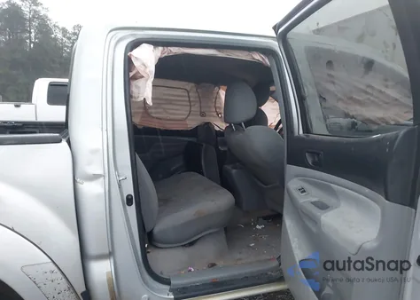 2009 Toyota Tacoma Base V6 z USA, uszkodzony, nr VIN 3TMLU42N09M027114